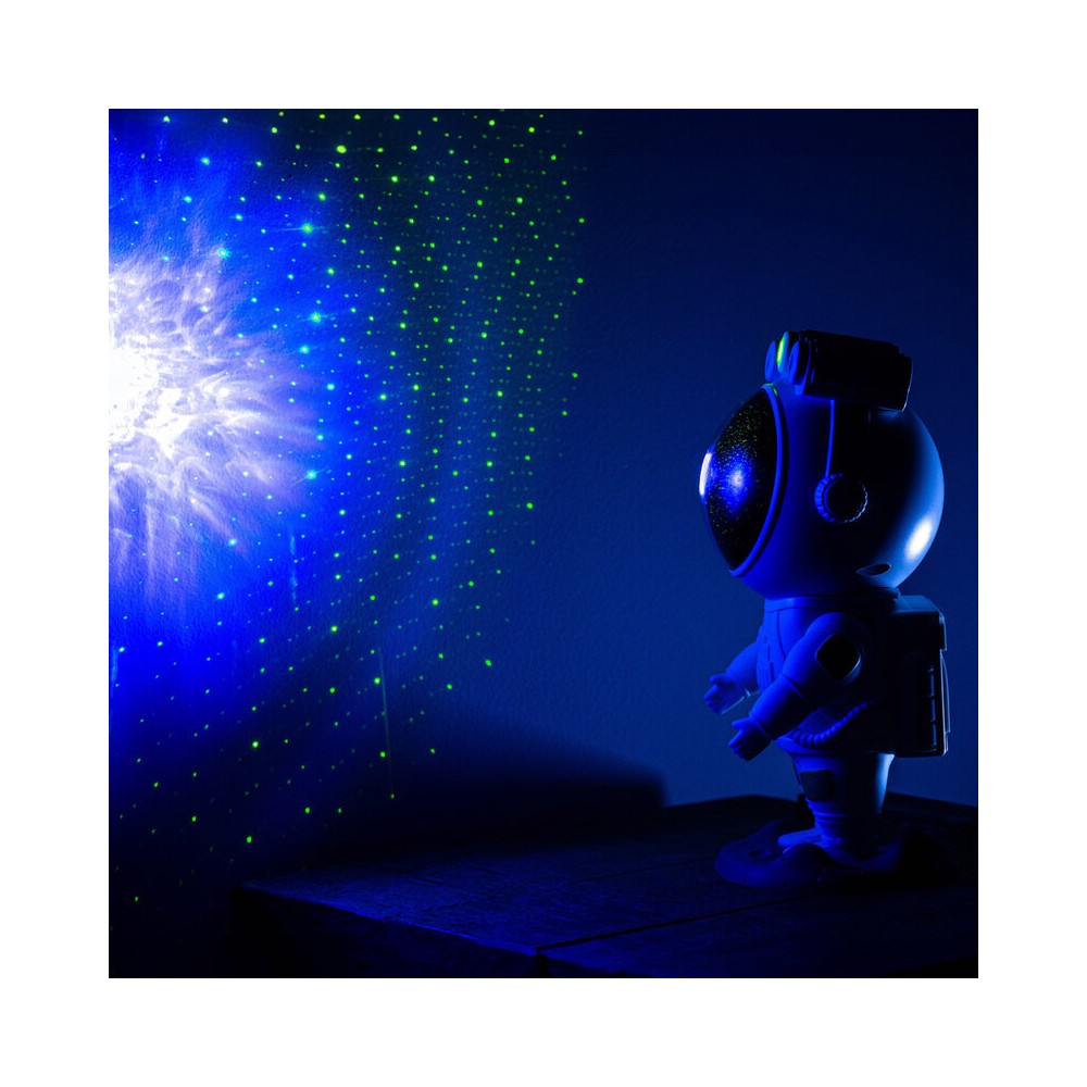 BoomTone DJ Playful astronaut-shaped night light that projects a moving nebula and green laser stars, lithium battery powered re