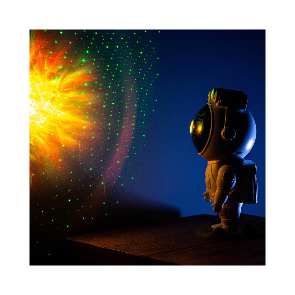 BoomTone DJ Playful astronaut-shaped night light that projects a moving nebula and green laser stars, lithium battery powered re